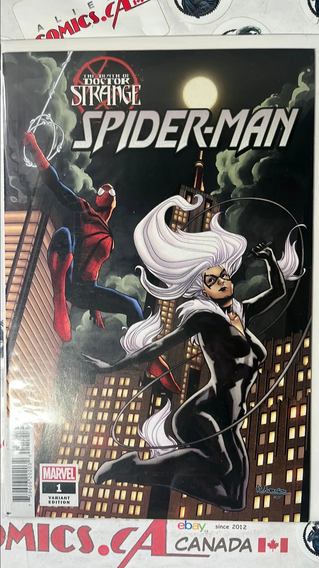 Amazing Spider-man (#1S Marvel 2022 Spidey & Black Cat Cover featuring Dr. Strange 1:25 Variant NM)