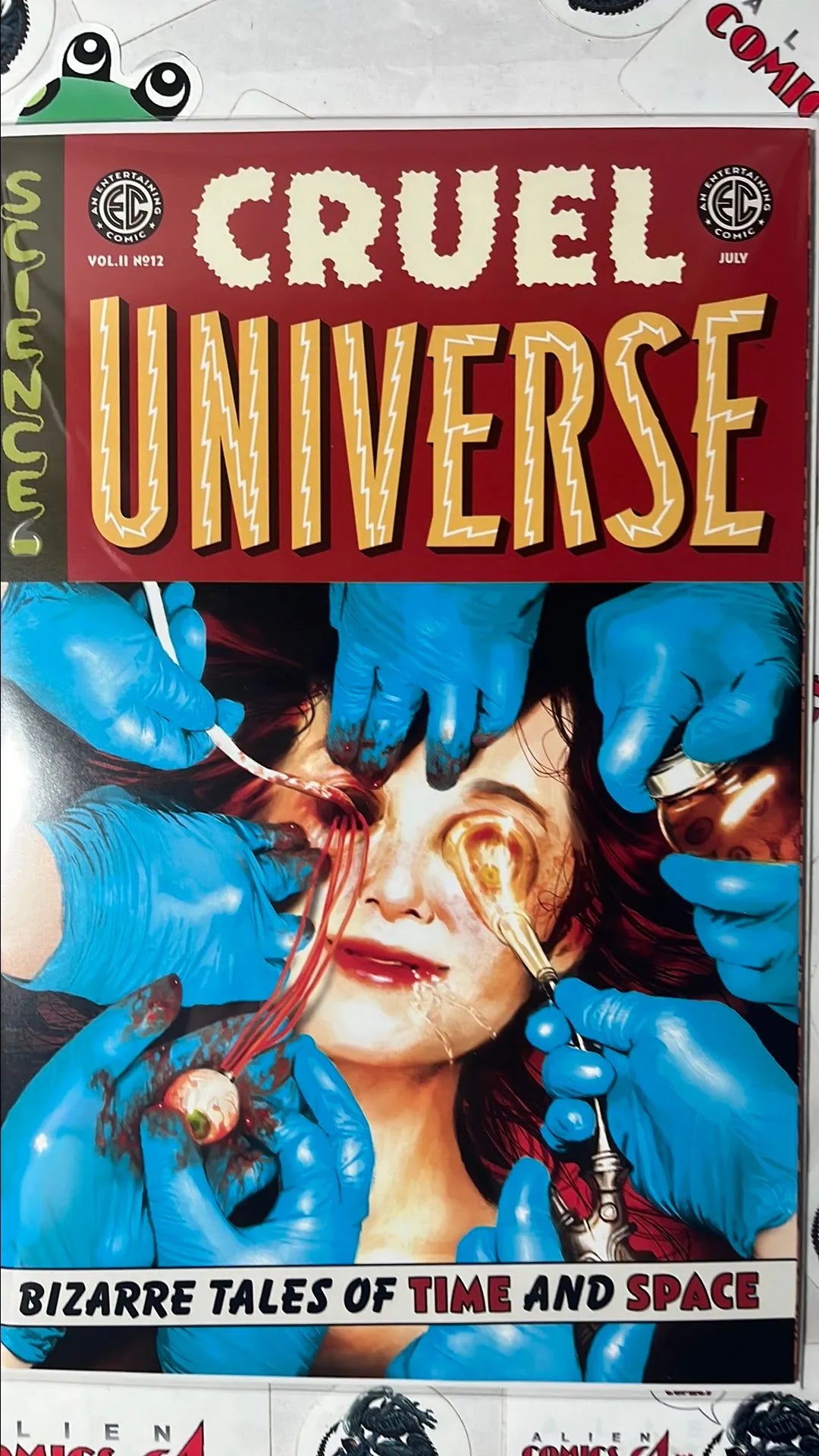 Cruel Universe (#12 EC/Oni Press 2026 Miguel Mercado Cover Dissecting Eyes and Face NM)