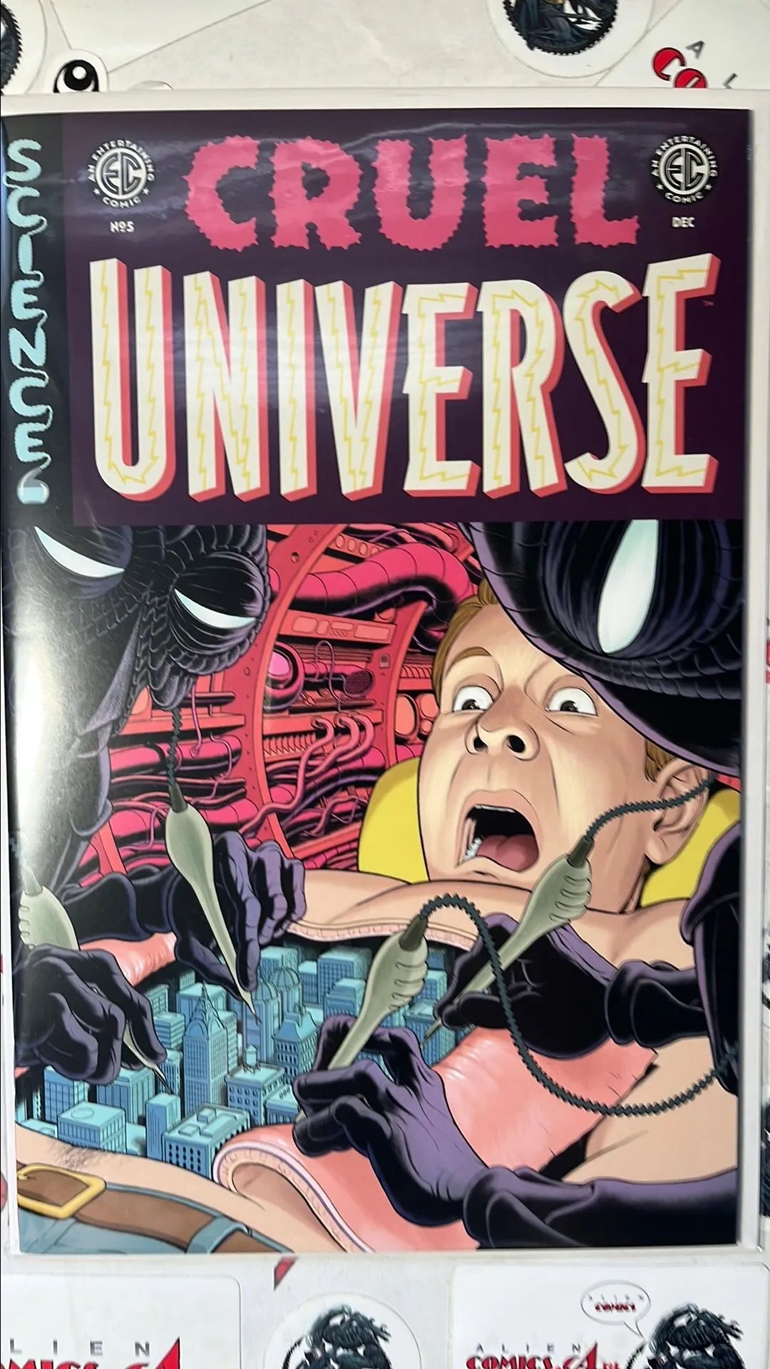 Cruel Universe (#5B EC/Oni Press 2024 Malachi Ward Variant Aliens operating on City Inside Man NM)